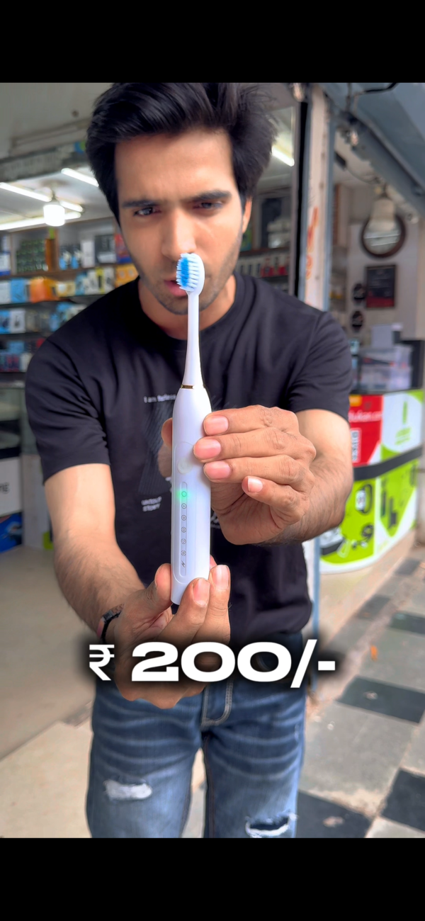 ELECTRONIC BRUSH